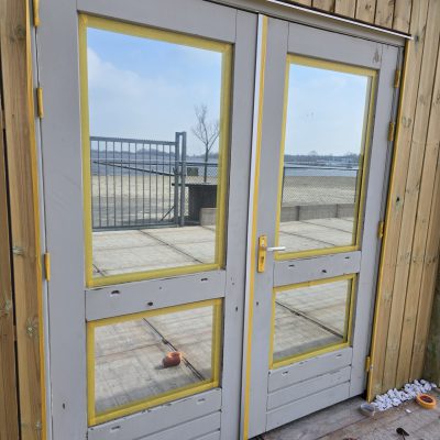 Old door needing repainting | Before professional refinishing | Nurenovation