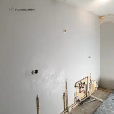 Room before a fresh layer of white plaster | Nurenovation